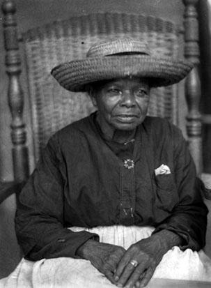 African-American woman in big straw hat