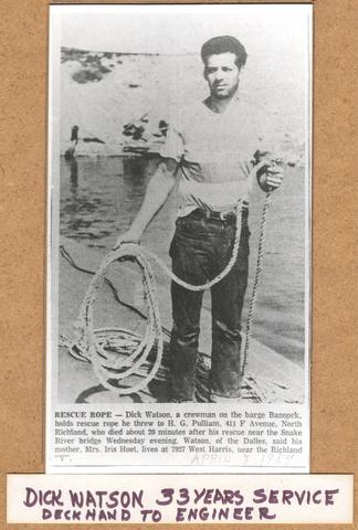 Dick Watson - 33 years of Service From Deckhand to Engineer; Dick Watson, a crewman on the barge Bannock, holds rescue rope he threw to H.G. Pulliam, 411 F. Avenue, North Richland, who died about 20 minutes after his rescue near the Snake River bridge Wednesday evening. Watson, of The Dalles, said his mother, Mrs. Iris Huet, lives at 7927 West Harris, near the Richland ""Y"".