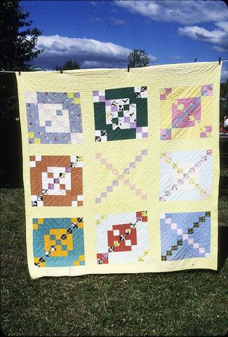 77 x 72 inch made around 1955 here in Junction City by Marguerite Jensen. Quilted by Mrs. Jensen for mom.