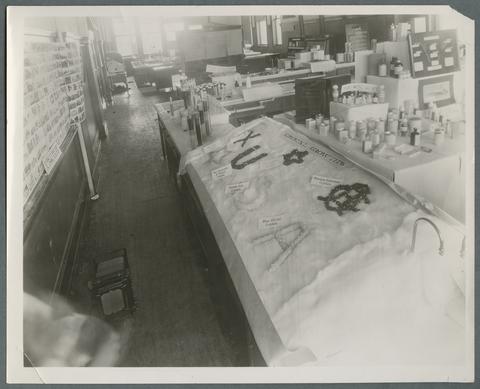 Pharmacy exhibit showing commercial and scientific departments