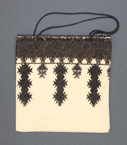 Handbag (re-purposed from the sleeve trim from a woman's garment) of heavy-weight natural cotton