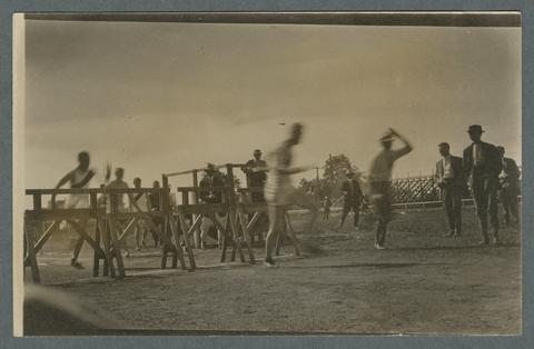 Track meet, hurdling event, circa 1910