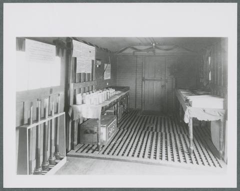 Interior view of a farming demonstration train car