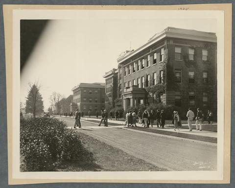 Students walking to class outside adjacent to Agriculture Hall