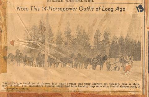 ""Note This 14-Horsepower Outfit of Long Ago"" Central Oregon freighters of pioneer days made certain that their cargoes got through, rain or shine, snow or mud. This unidentified 14-horse outfit had been bucking deep snow on a Central Oregon road, in the Jackpine country.